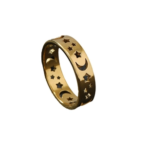 Golden titanium steel openwork ring featuring celestial star and moon patterns