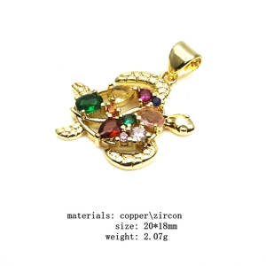 Detailed view of turtle pendant with colorful zircon stones, copper, 20x18mm size