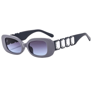 Square grey frame sunglasses with blue gradient lenses and crystal temple detail
