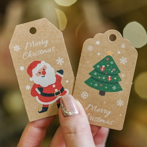 Christmas kraft paper gift tags with Santa Claus and tree design for holiday decor.