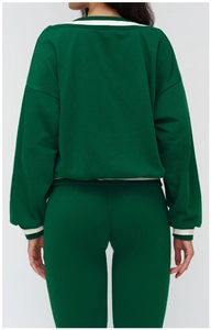 Back view of a deep green loose-fit sports sweatshirt with white stripe collar detail