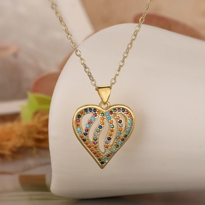 Elegant gold-plated hollow heart pendant necklace with colorful zircon stones in close-up