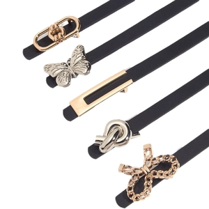 Set of five skinny black leather belts for women with diverse gold buckle designs