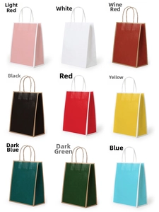 Macro display of kraft paper gift bags featuring nine colors and twisted rope handles