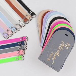 Multi-color PU leather luggage tags with adventure text on white background