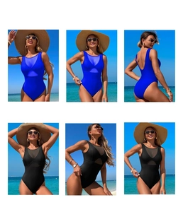 Detail of slimming one-piece swimsuit with sheer mesh panels in blue and black colors