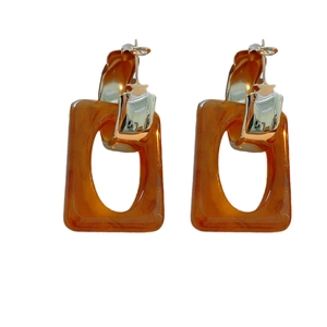 Silver rectangle drop earrings with amber translucent resin charm in geometric style