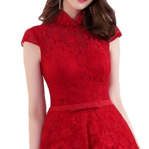 Detail of red lace dress with mandarin collar, Chinese frog buttons and bow belt