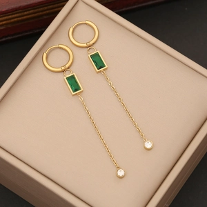 Elegant gold tassel earrings with emerald green gemstones and clear zircon pendants