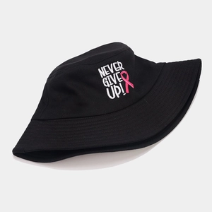 Black cotton bucket hat featuring NEVER GIVE UP embroidery and pink ribbon design