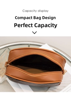 Top-down macro view of brown crossbody bag showing internal capacity and zipper