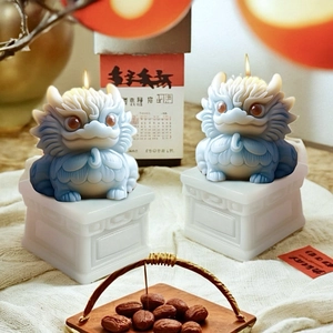 Detailed blue and white gradient dragon candles on square stone-textured bases