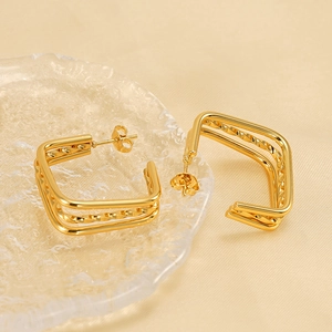 Modern triple-layer gold titanium steel square earrings with twisted spiral texture details
