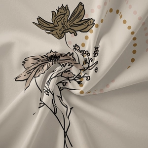 Detailed view of soft beige wall tapestry fabric with floral prints and elegant folds