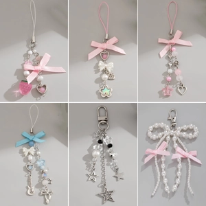 Cute strawberry bow keychain and star charms set in pink, blue, and silver styles