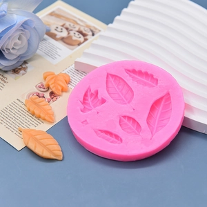 Pink silicone leaf mold for fondant chocolate cake decoration with diverse leaf textures