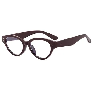 Retro cat-eye red-brown eyeglasses frame with silver dot accents in a high-quality finish