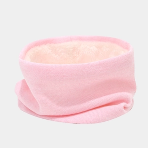 Close-up of pink knitted winter neck warmer with thick soft fleece lining for warmth