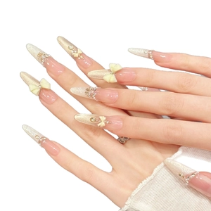 Pink gradient long stiletto press-on nails with 3D bows, pearls and sparkling rhinestones