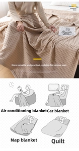 Detailed texture of khaki waffle cotton gauze blanket for sofa or summer bedding use