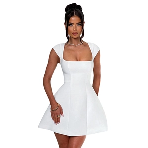 Detailed view of the square neckline and cap sleeves on a white minimalist mini dress