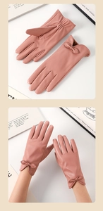 Dettaglio di guanti rosa in pelle PU da donna con piccolo fiocco e calda fodera in pile