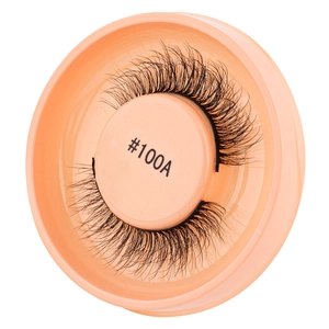 Macro shot of thick curly black self-adhesive eyelashes in tray, model #100A