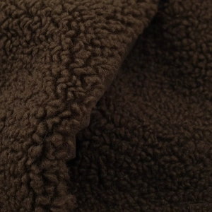 Close-up of deep brown thick sherpa fleece fabric texture on high-quality winter coat