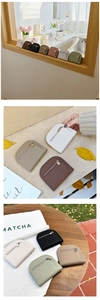 Multi-colored semi-circle coin purses in litchi texture leather with metal zippers