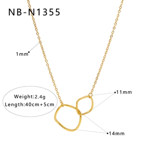 Detail of gold geometric interlocking square pendants with size specifications in millimeters