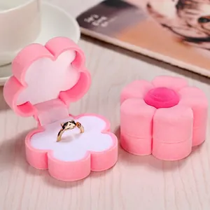 Pink velvet flower-shaped jewelry box with soft flocking for rings and necklaces