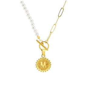Asymmetric gold necklace with white pearls, OT toggle clasp, and letter M round pendant