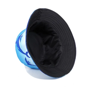 Blue reversible bucket hat with dolphin print pattern for outdoor sun protection