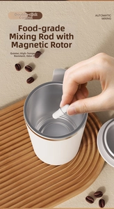 Detail of food-grade magnetic rotor being placed inside the white automatic stirring mug
