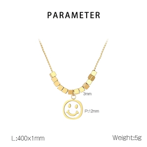 Detail view of gold smiley face pendant and square beads necklace with size parameters