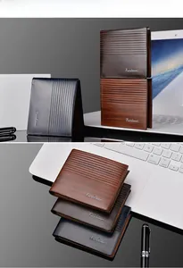 Detailed macro view of men's wood-grain textured leather wallets in three business colors