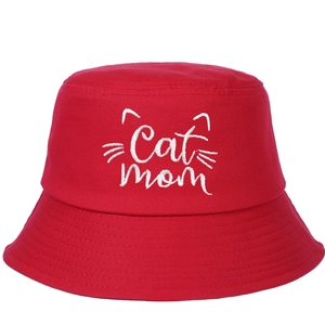 Red cotton bucket hat featuring white Cat Mom embroidery with feline whiskers and ears