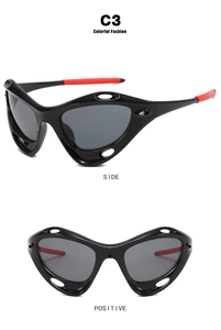 Front and side views of black Y2K sports sunglasses with cutout frames and red temple tips