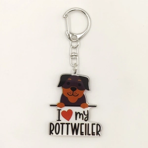 Close-up of a 2D acrylic Rottweiler keychain with I Love My Rottweiler text and metal ring