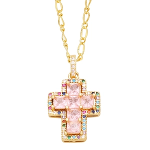 Gold cross necklace featuring a large pink zircon center and colorful gemstone borders