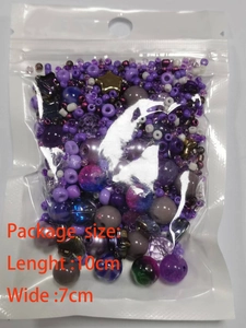 Macro detail of mixed purple glass beads in a 10cm x 7cm bag for DIY jewelry making