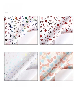 Detailed gift wrapping paper show with four heart patterns including gold and laser finish
