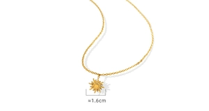 Detailed macro view of 18K gold-plated sun pendant necklace with 1.6cm diameter size