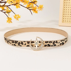 Leopard print leather belt featuring a crystal moon and star buckle with gold beaded edges