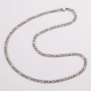 Detailed close-up of polished silver stainless steel 3:1 curb chain necklace links