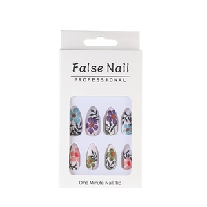 Floral press-on nails in matte vintage finish with professional display packaging