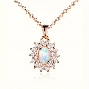 Rose gold sunflower pendant necklace with oval opal and sparkling zircon stones