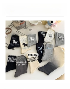 Detail of Korean-style cotton socks featuring cartoon dogs, bowknots and jacquard patterns