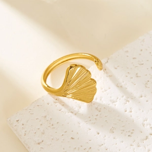 Detailed macro shot of an adjustable gold-plated stainless steel ring with a ginkgo leaf motif