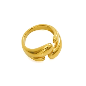 Macro detail of high-polish 18K gold-plated stainless steel streamlined open ring